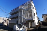 東京都八王子市の鉄骨造4階建外壁リノベーション施工事例、清潔感あふれる白