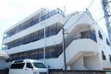 千葉県千葉市の鉄筋コンクリート造4階建外壁リノベーション施工事例、街に調和するオールホワイト